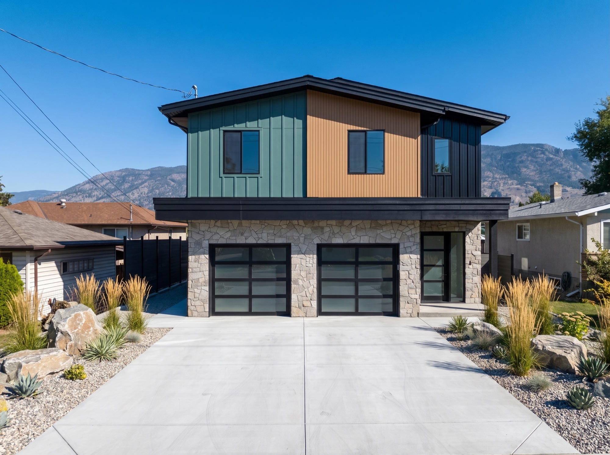 Modern stone and steel exterior, front elevation